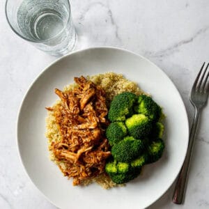 Healthy Shredded Chicken Recipes: Delicious & Nutritious 1 A plate of shredded chicken served with steamed broccoli and quinoa.