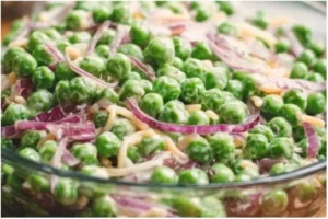 Easy English Pea Salad 2 Bowl of Easy English Pea Salad with fresh ingredients and vibrant colors